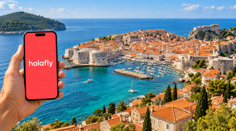 Móvil con Holafly en pantalla ante los tejados y murallas de Dubrovnik