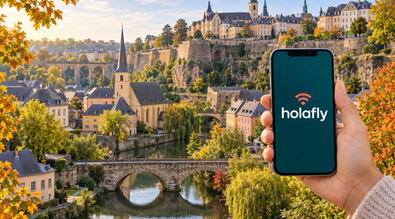 Móvil con Holafly en pantalla ante el Grund, ilustración de eSIM para Luxemburgo